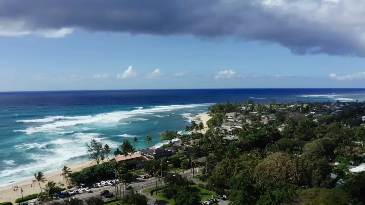 North Shore coastline near Sunset Beach with beachfront property cost text