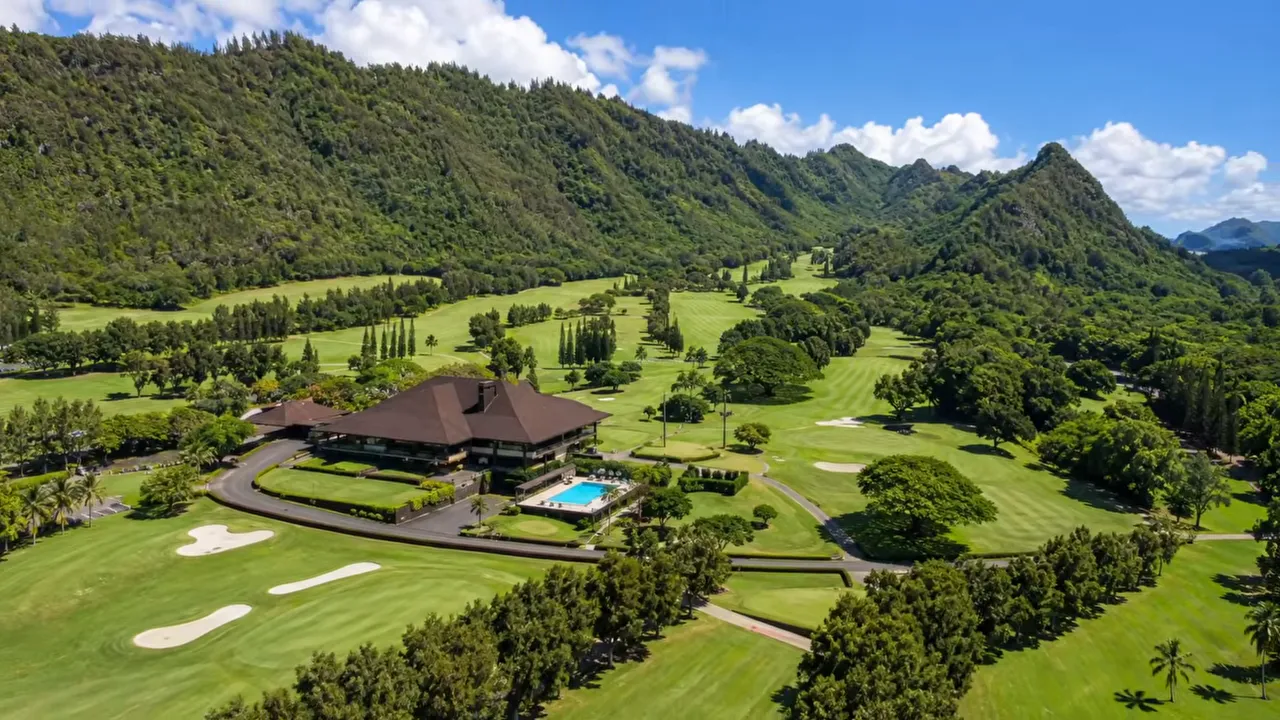 Oahu Country Club golf course surrounded by green mountains