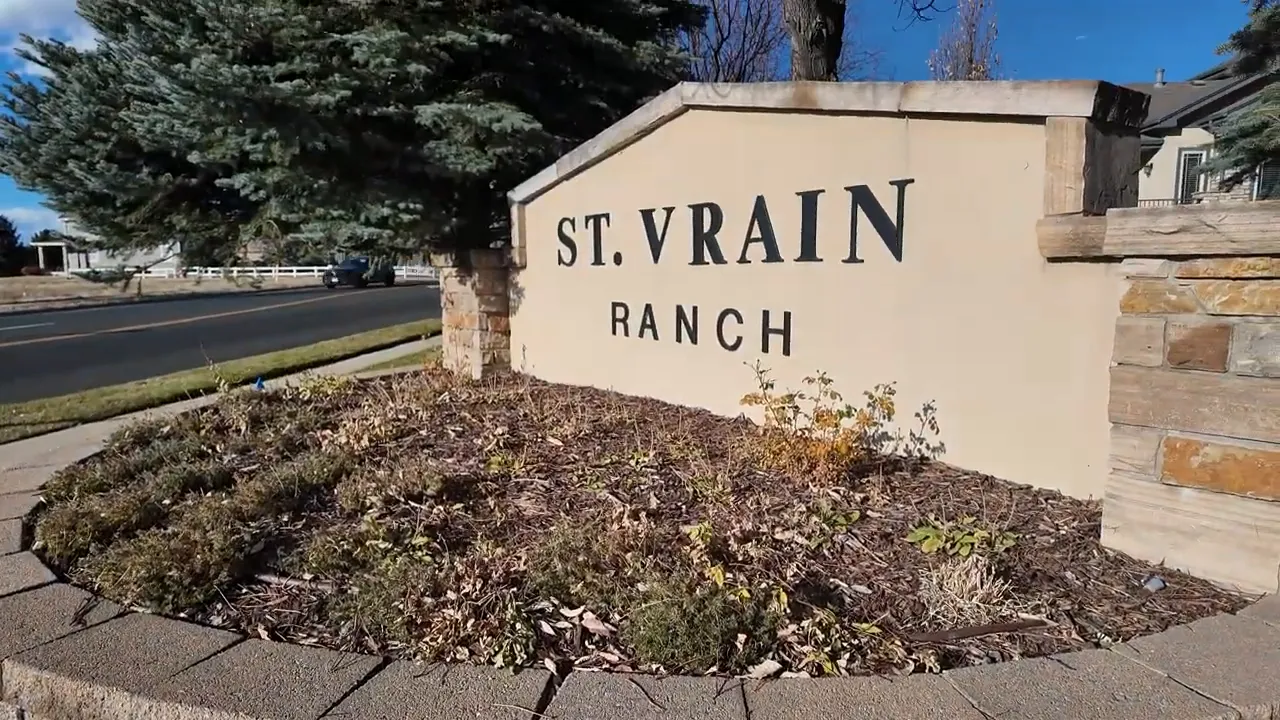 stone neighborhood monument sign reading St Vrain Ranch