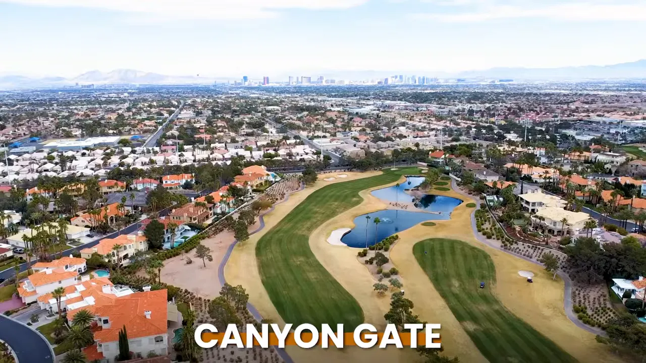 Aerial view of Canyon Gate golf course surrounded by homes