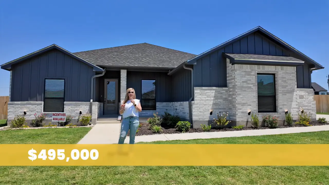Gray and white brick five bedroom home with price graphic