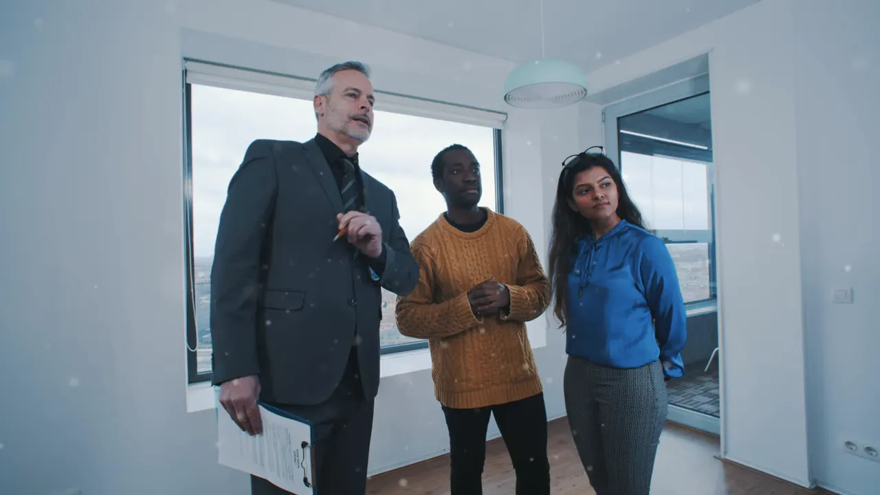 Real estate agent leading a group tour inside a new home