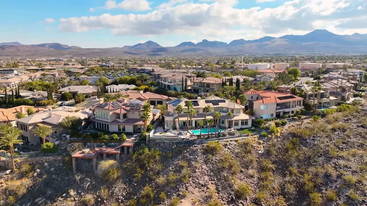 Aerial view of Las Vegas homes with Lock and Leave Lifestyle text