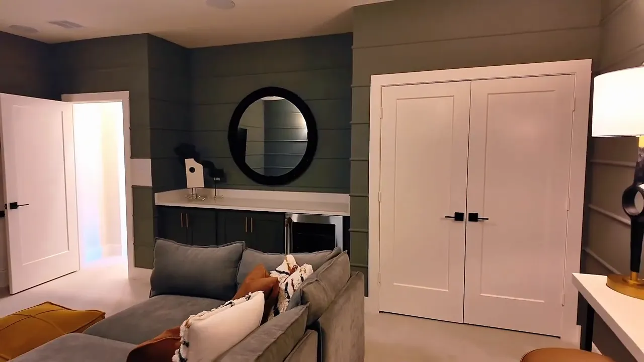 Built-in bar area with countertop and two-door storage in a new construction home upstairs