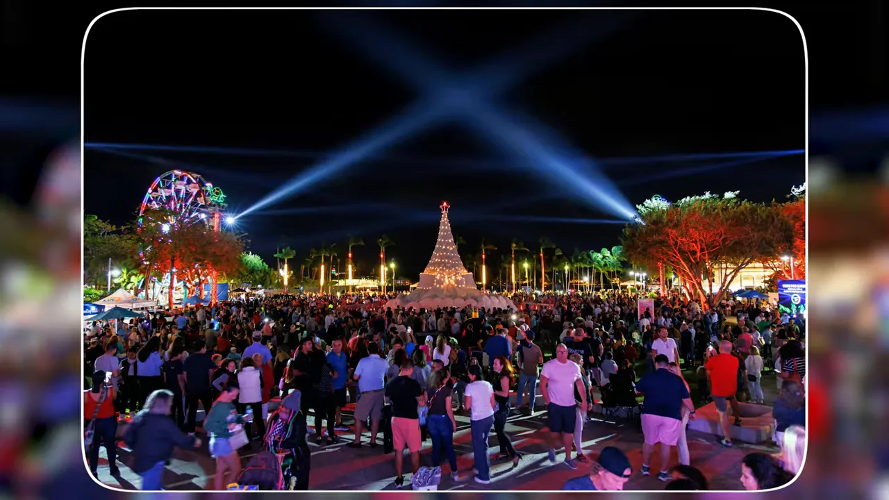 Crowd at night during a festival with large holiday-style lights and Ferris wheel in West Palm Beach