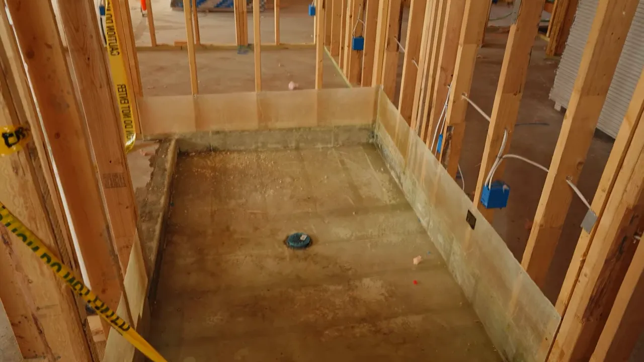 Open pre-drywall interior view showing framed walls and HVAC-related routing areas