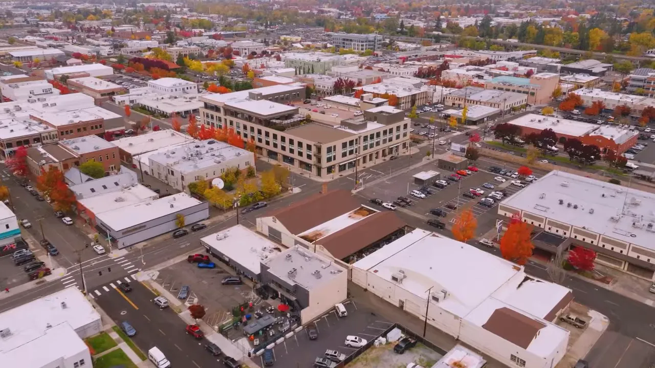 Aerial view of Medford, Oregon with major institutional and medical buildings and surrounding streets