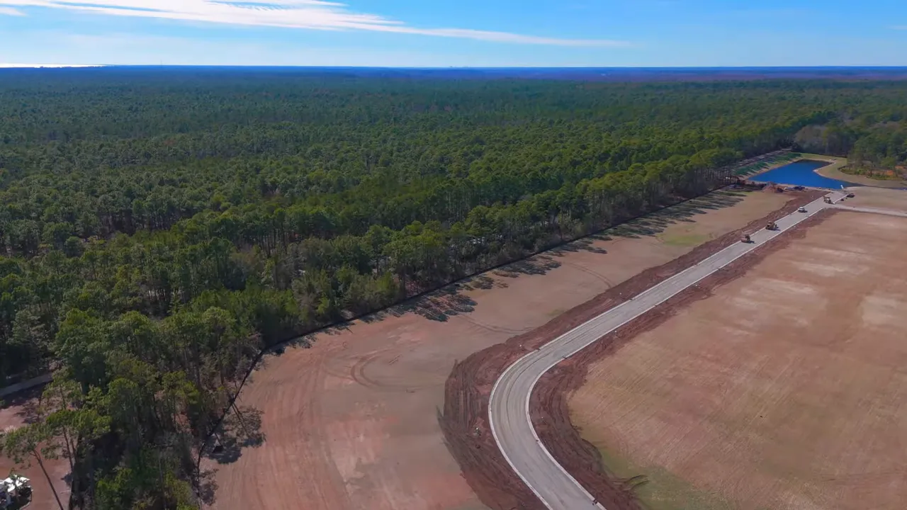 Aerial view of wooded land and road in Murrells Inlet area