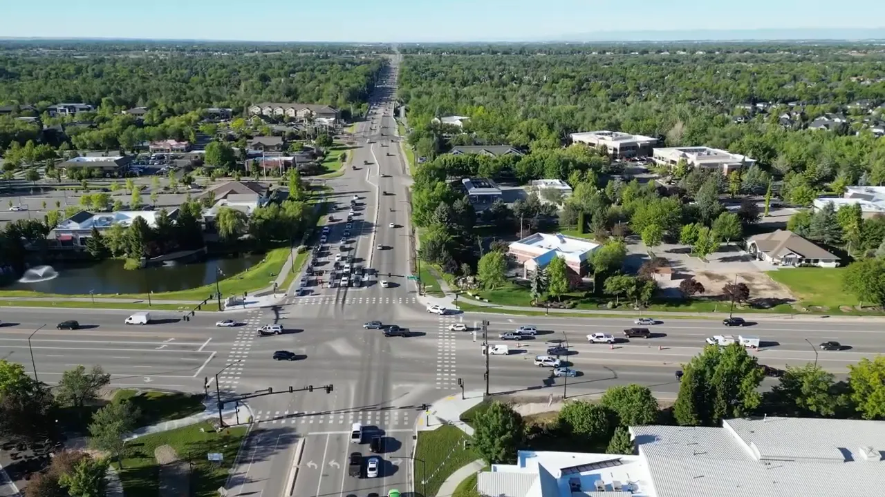Aerial view of a large busy intersection with multiple lanes of traffic in Eagle