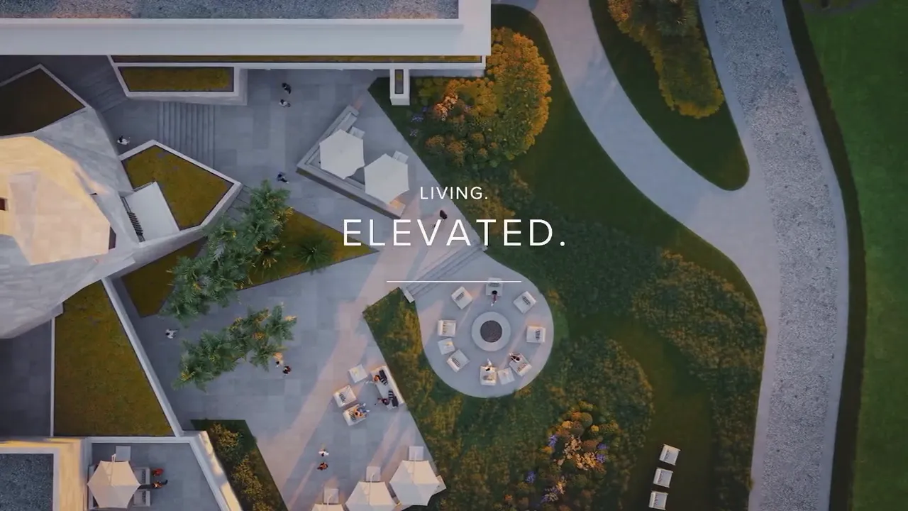 Avenir Panther National luxury community aerial view showing homes, outdoor dining area, and preserved landscaping