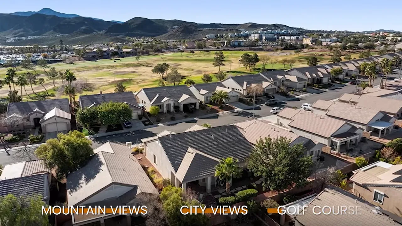 Homes bordering golf course with mountain and city views at MacDonald Ranch