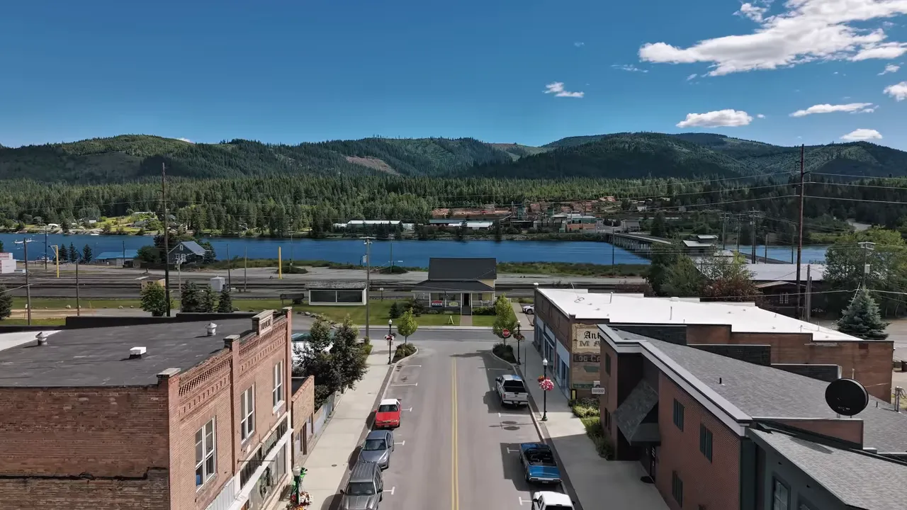Aerial view down downtown Priest River toward the river and bridge