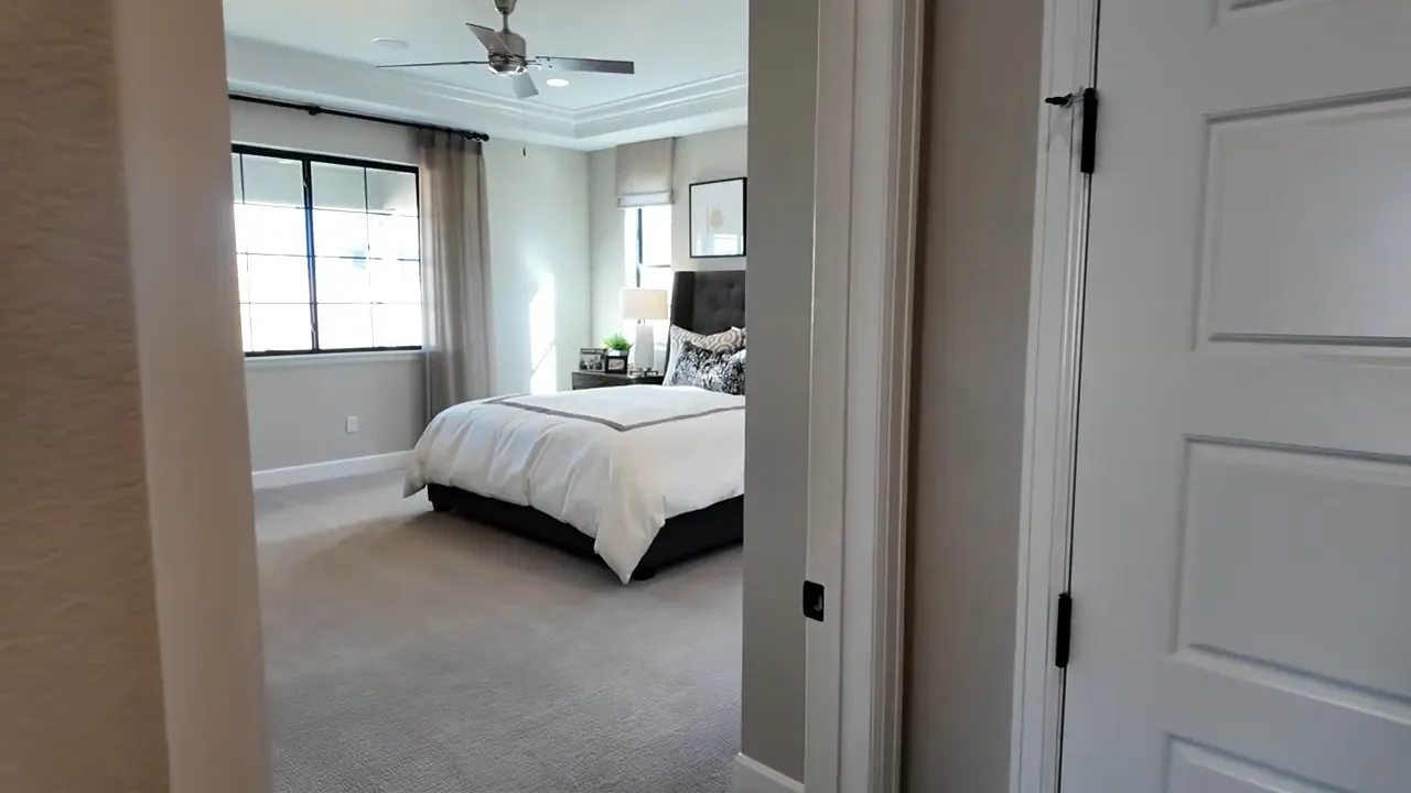 Bright owner’s suite bedroom in the Arlington model at Independence subdivision in Elizabeth, Colorado