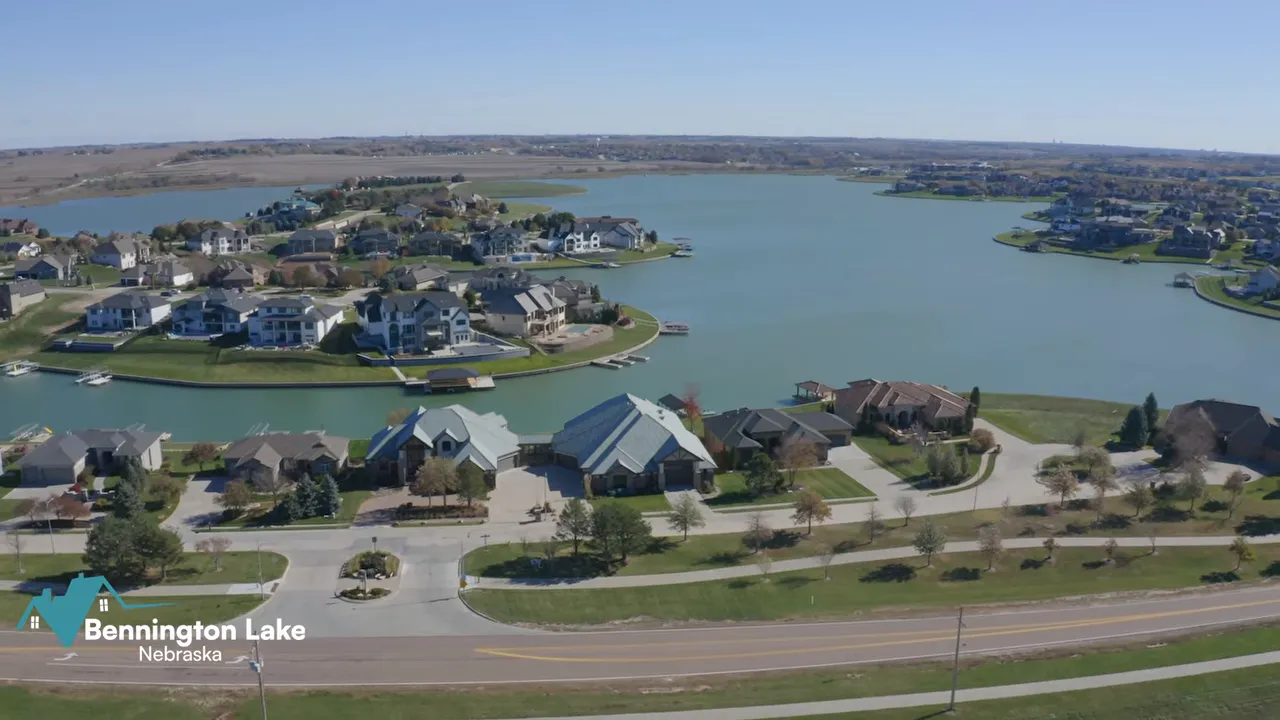 Aerial view of Bennington Lake surrounded by homes docks and shoreline
