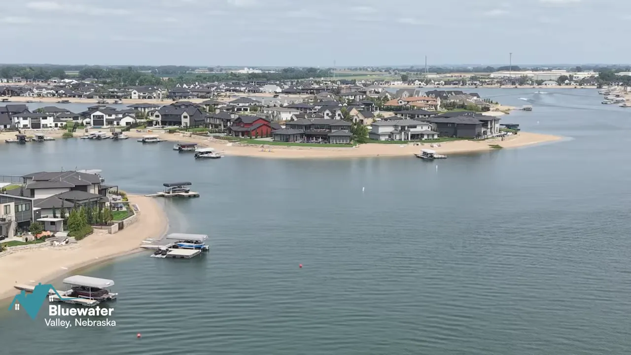Aerial view of waterfront homes and private docks at Bluewater in Valley