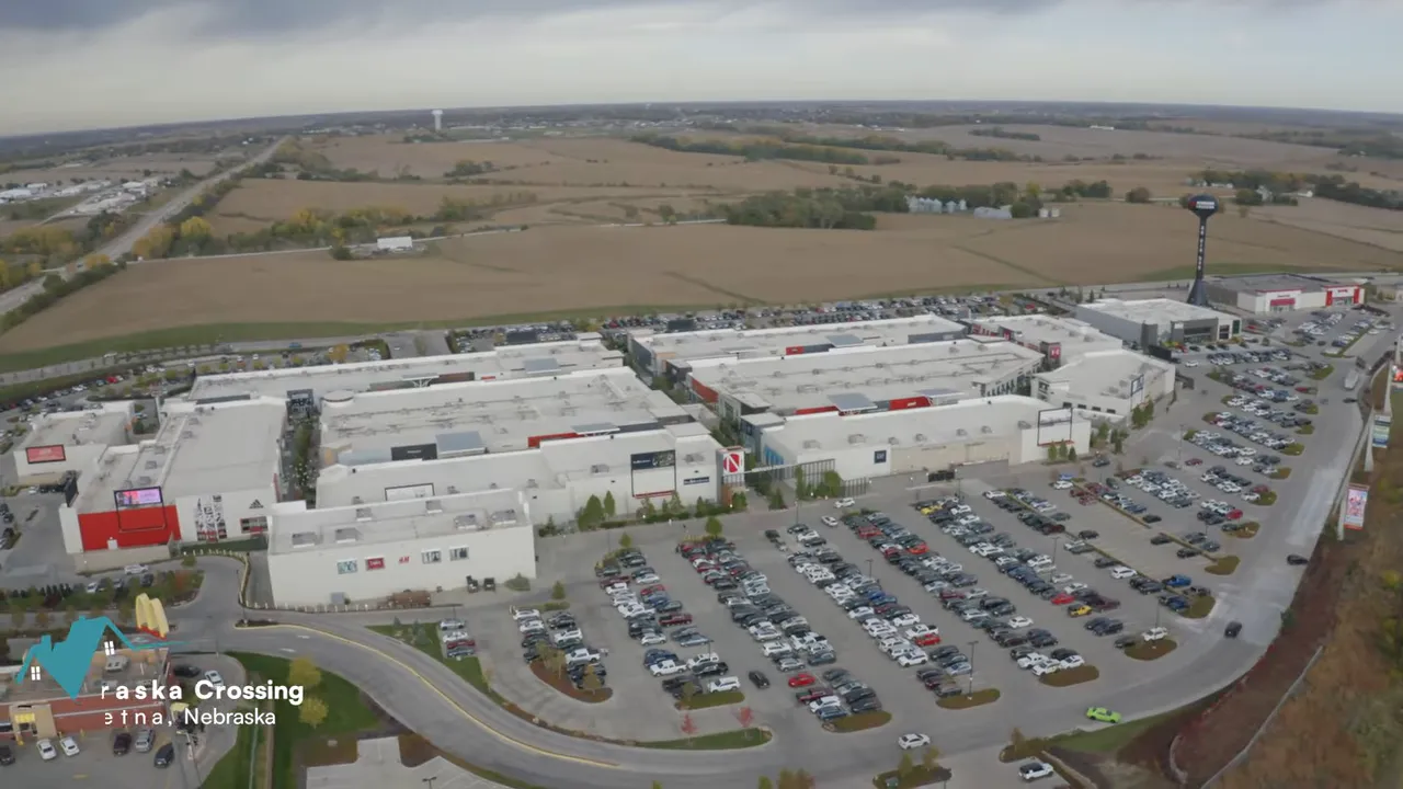 Aerial view of Nebraska Crossing shopping center and parking lots in Gretna