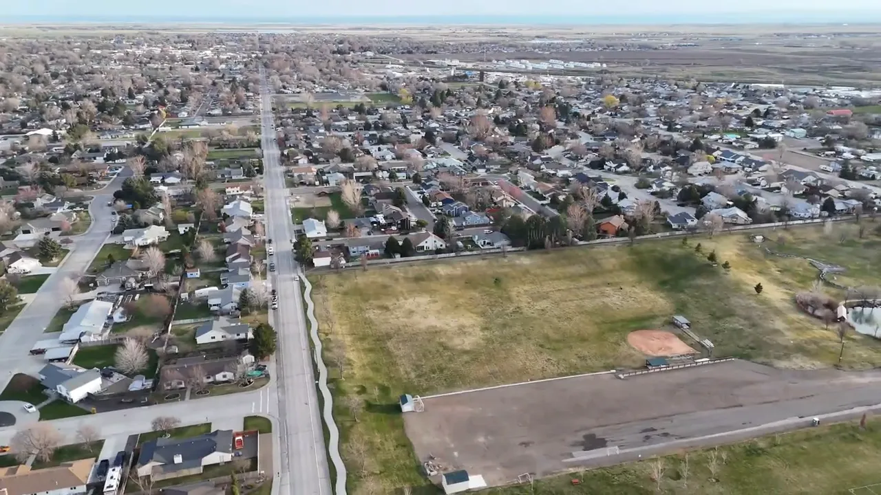 Aerial view of Mountain Home Idaho streets, homes, and open lots