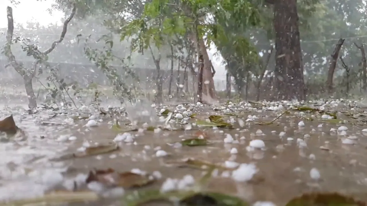 Stormy weather scene with heavy rain and hail outdoors