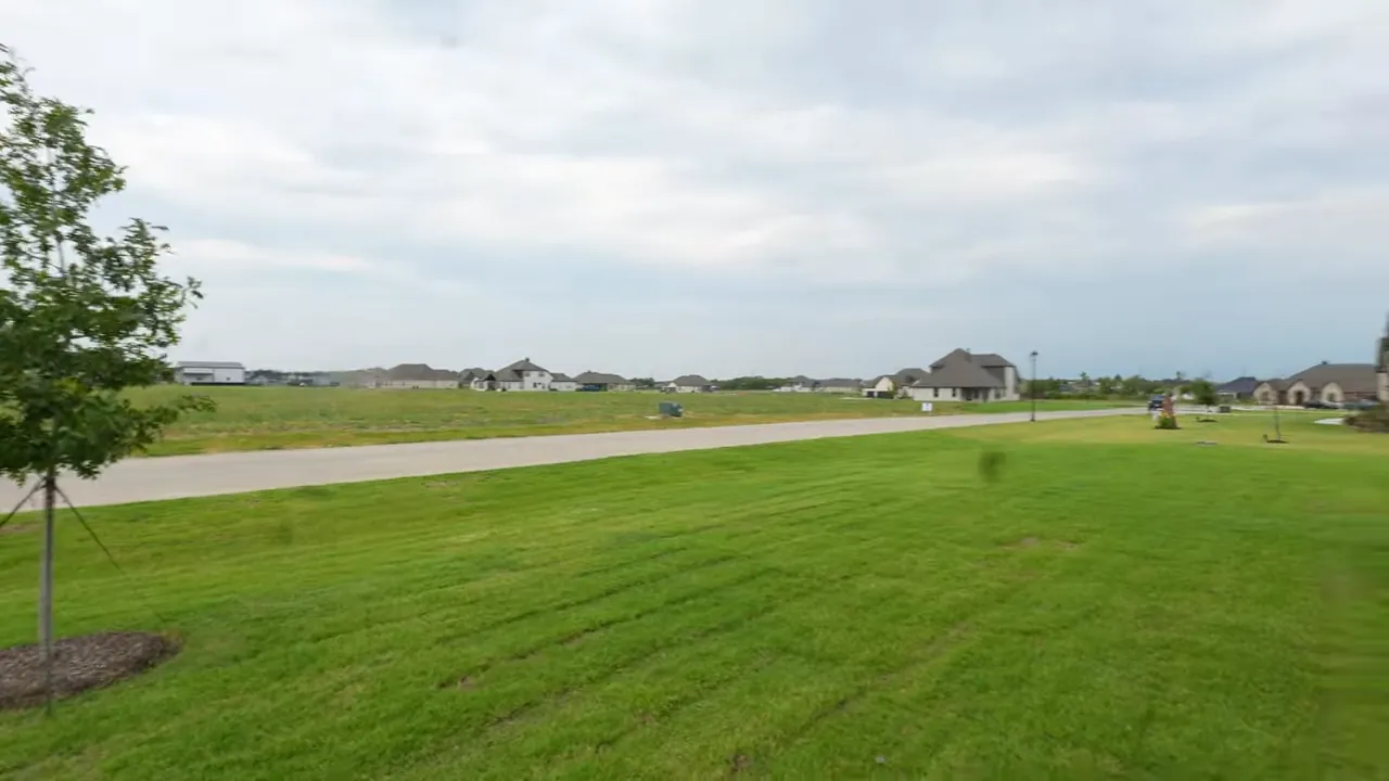 Aerial view of the neighborhood showing lot distribution and open space