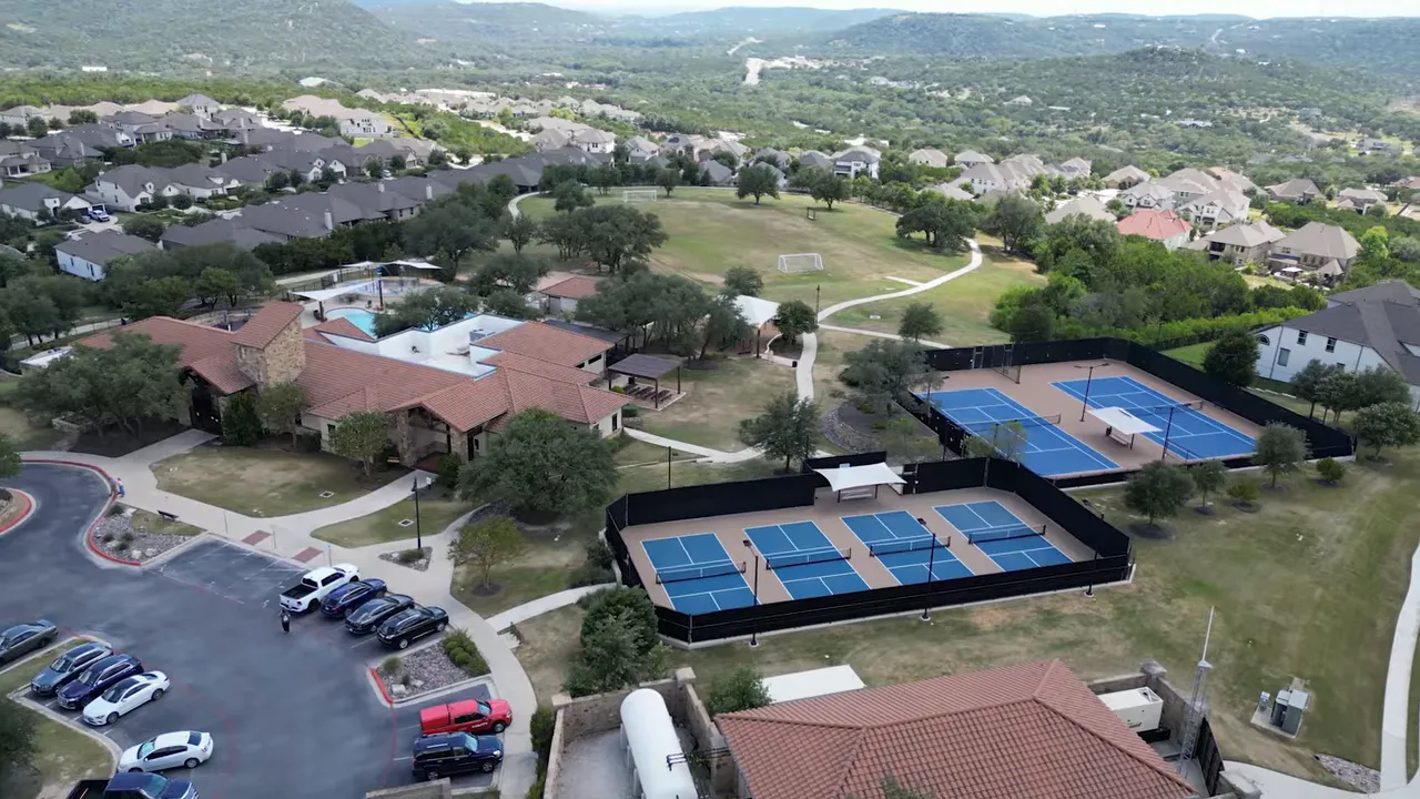 Aerial view of Leander neighborhood with school buildings