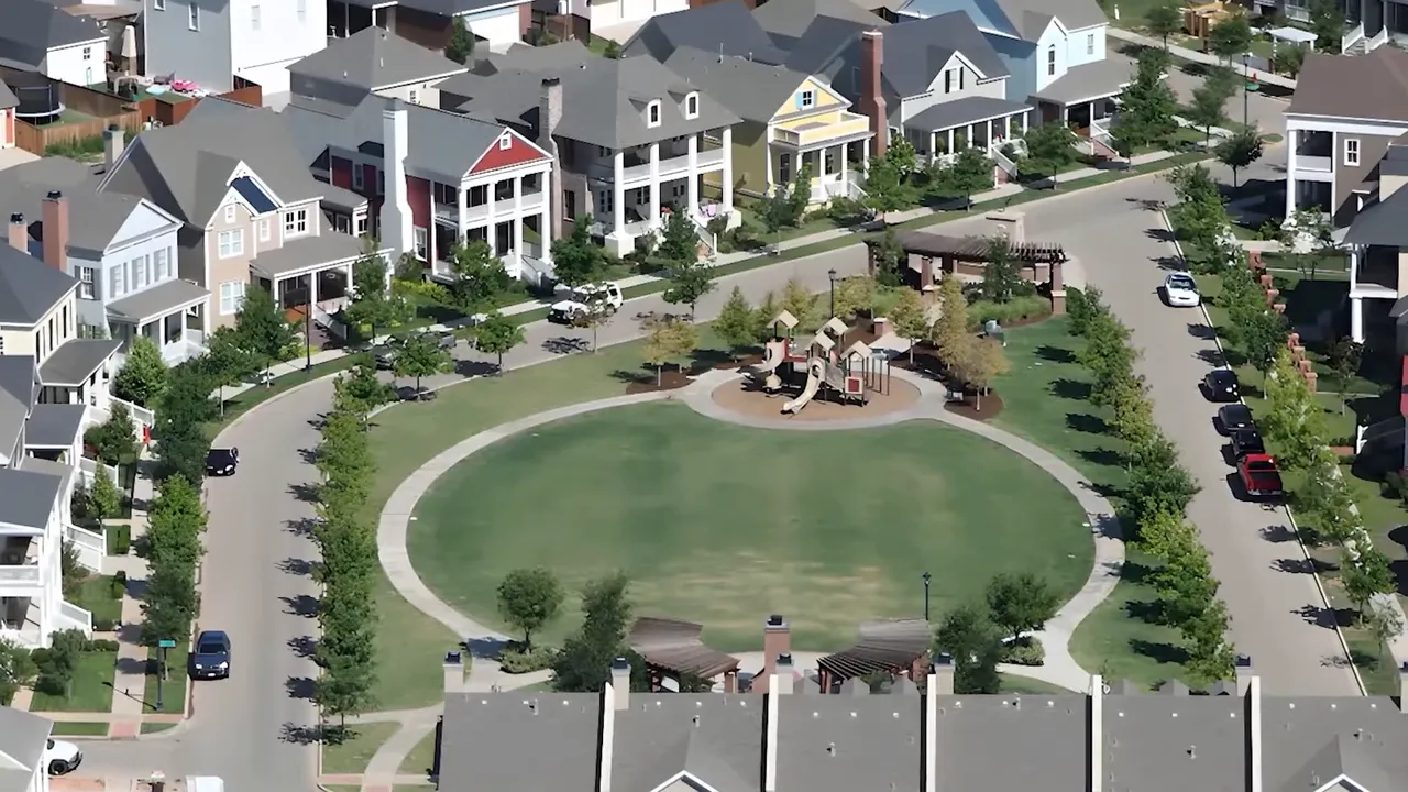 Vintage Township street with manicured lawns and sidewalks