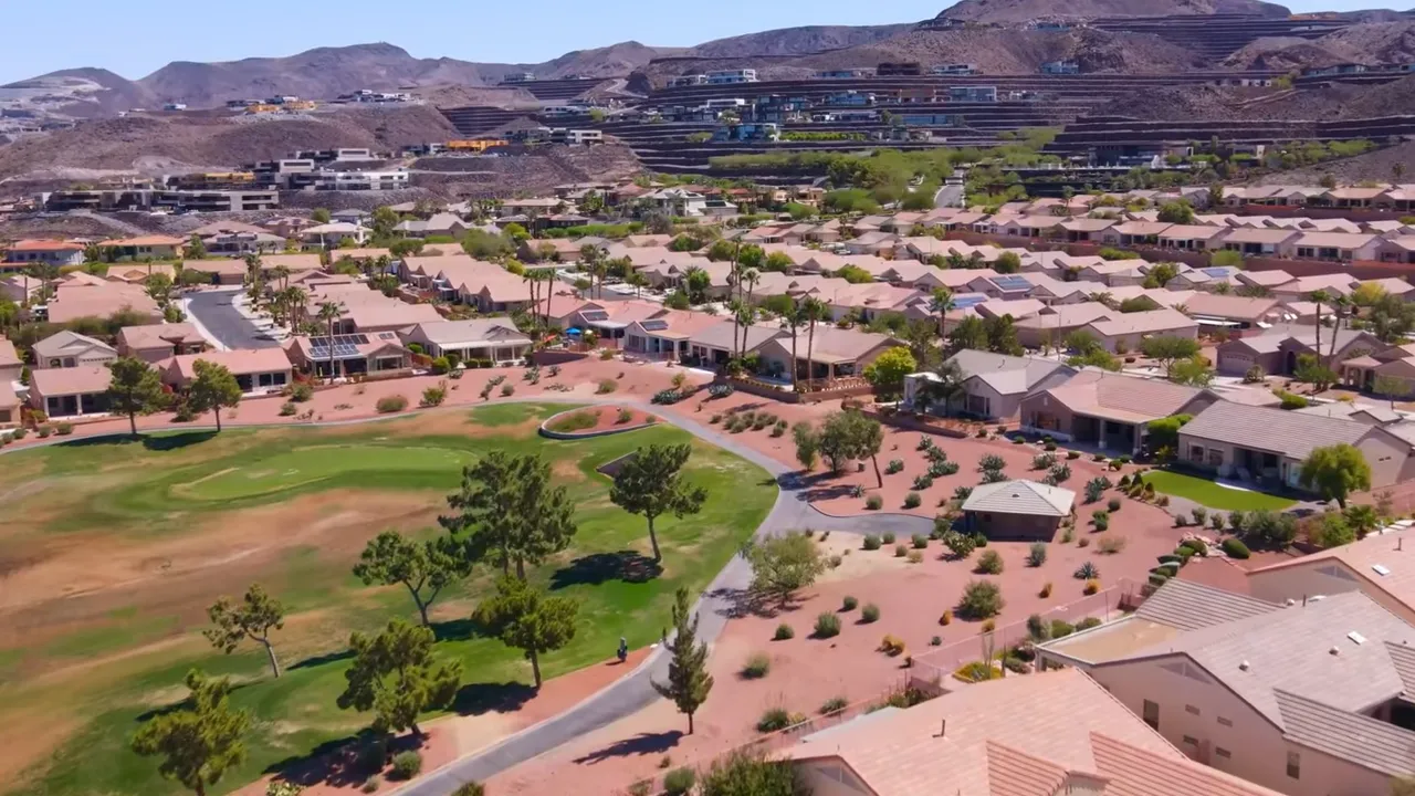 Two Las Vegas home listings priced at four hundred twenty four thousand and four hundred thirty five thousand dollars