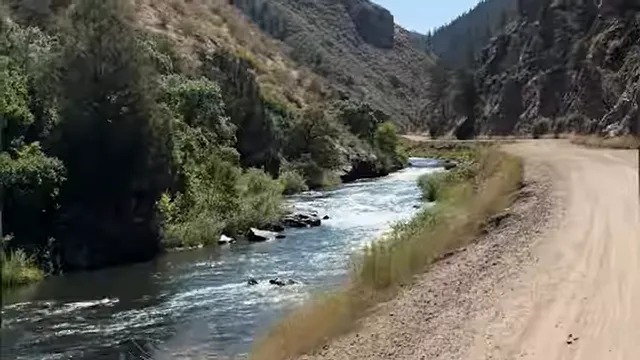 South Platte River flowing beside a dirt road in Waterton Canyon