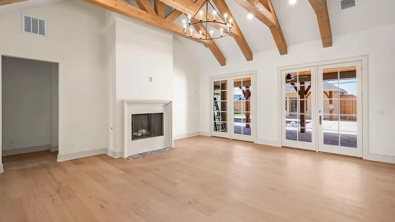 Interior beams and warmer finishes in Sedona Community home
