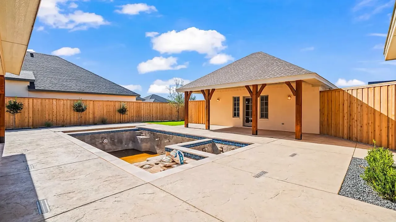 Backyard and unfinished pool in Sedona Community home
