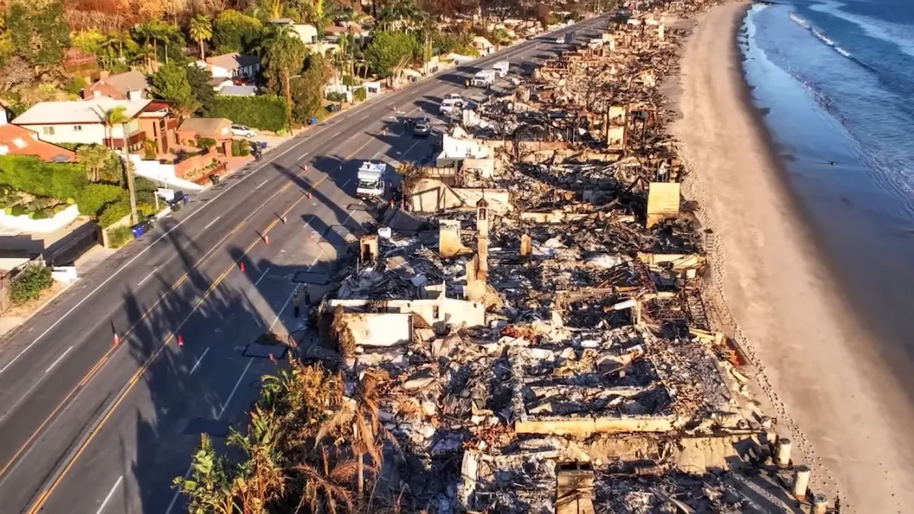 Aerial view of fire damaged beachfront properties along the Malibu coast