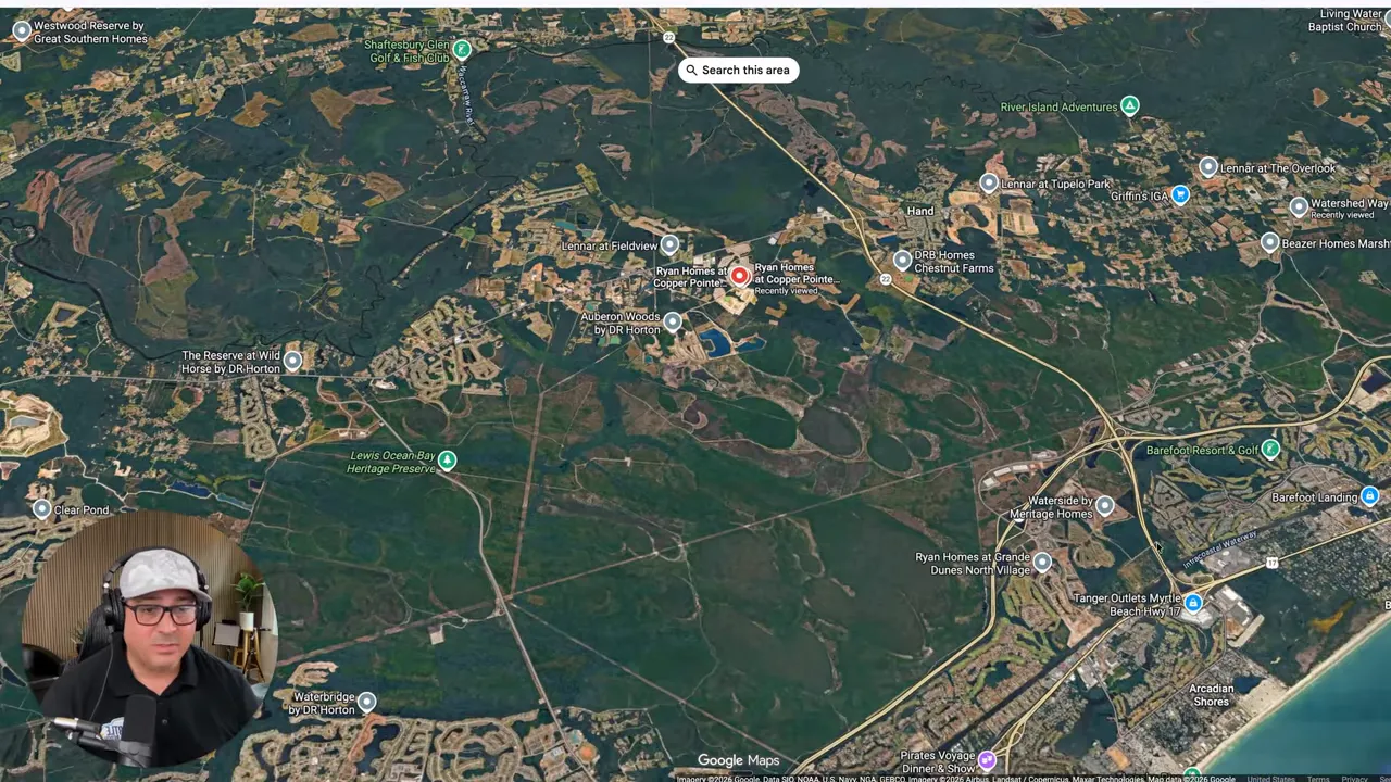 aerial view of commercial area and roads near the community location