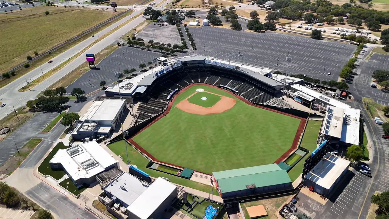 Aerial view of Dell Diamond baseball stadium in Round Rock with surrounding parking lots