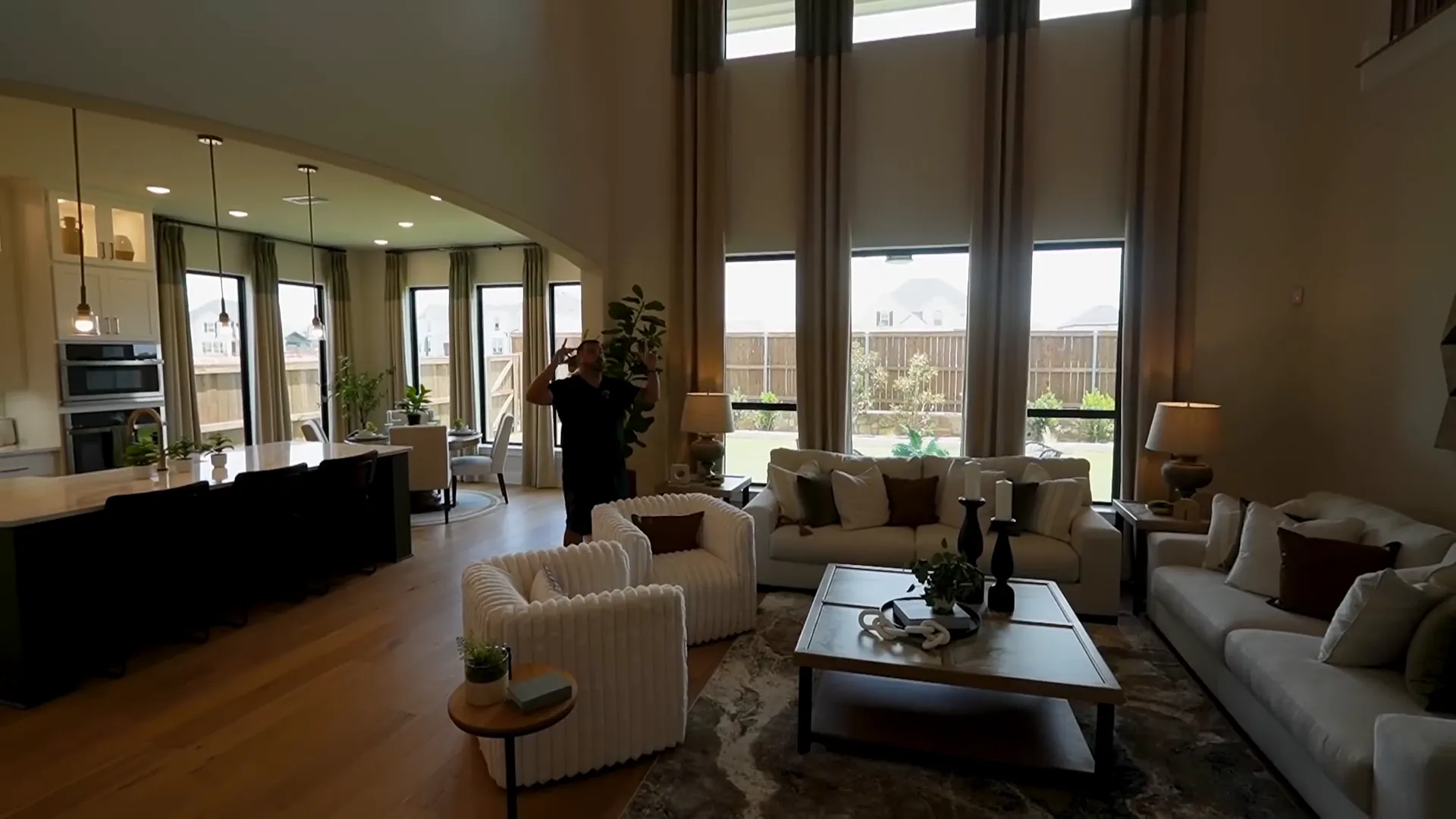 Living room with soaring ceilings and open railing system