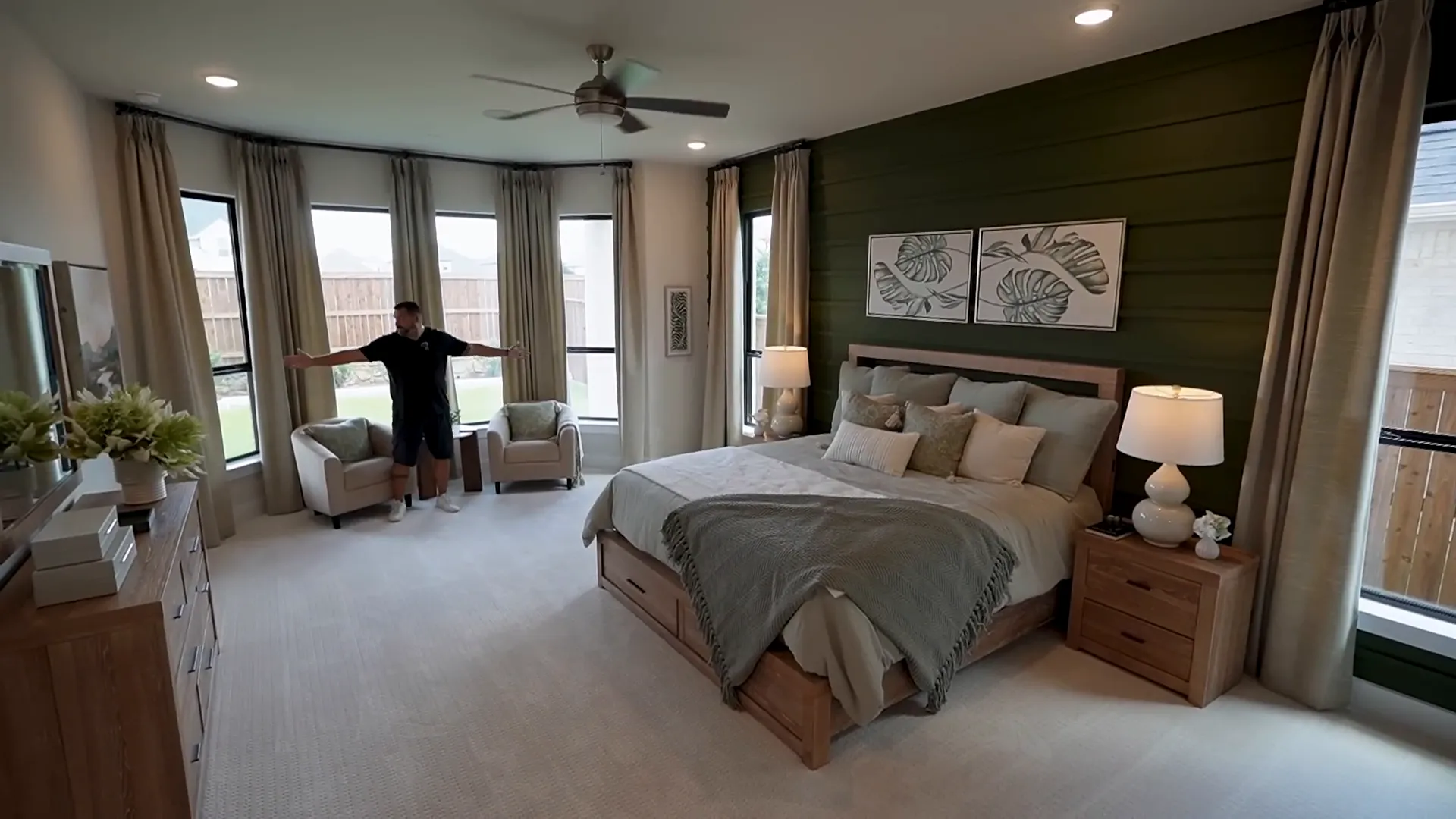 Primary suite with large bay window and sitting area