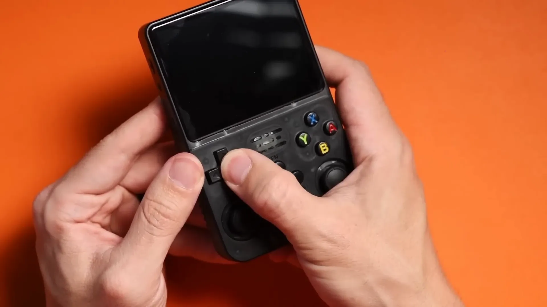 Close-up of R36S buttons and ports