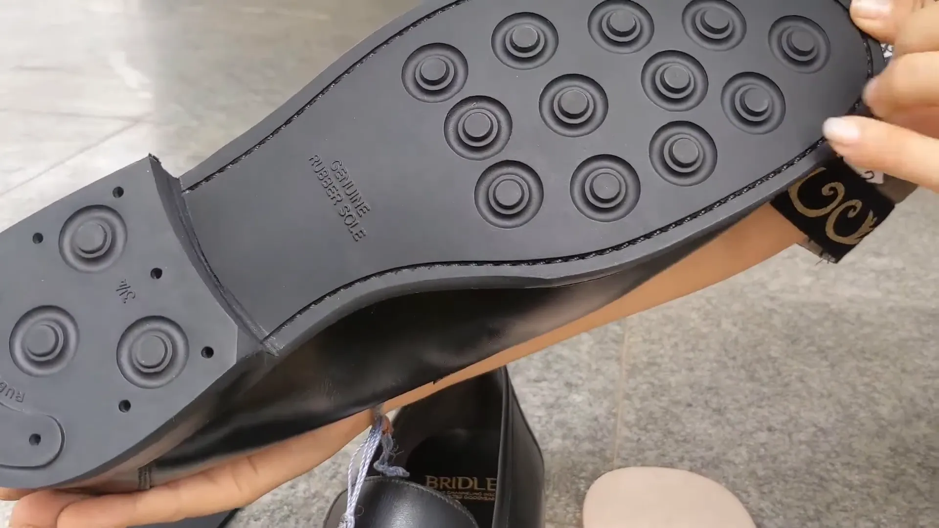 Traveler rushing through an airport wearing rubber-soled shoes