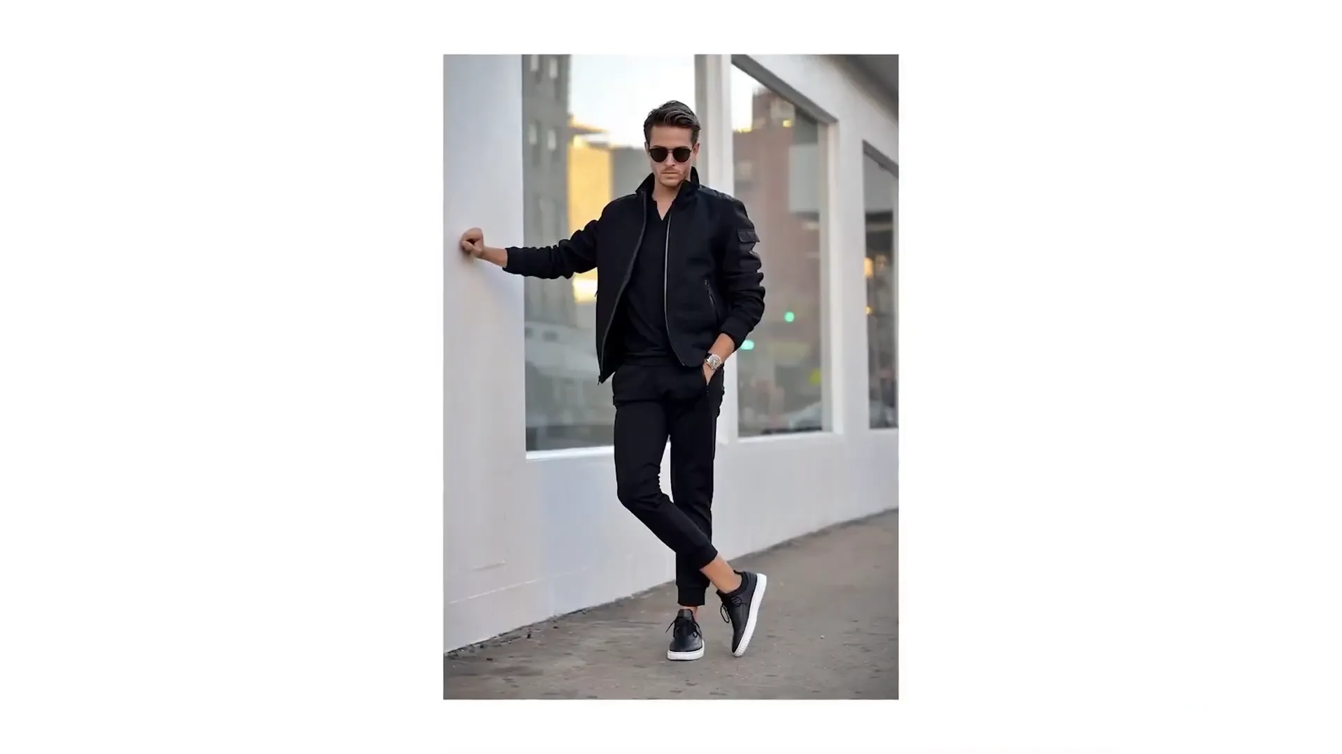 Pushed up sleeves of bomber jacket