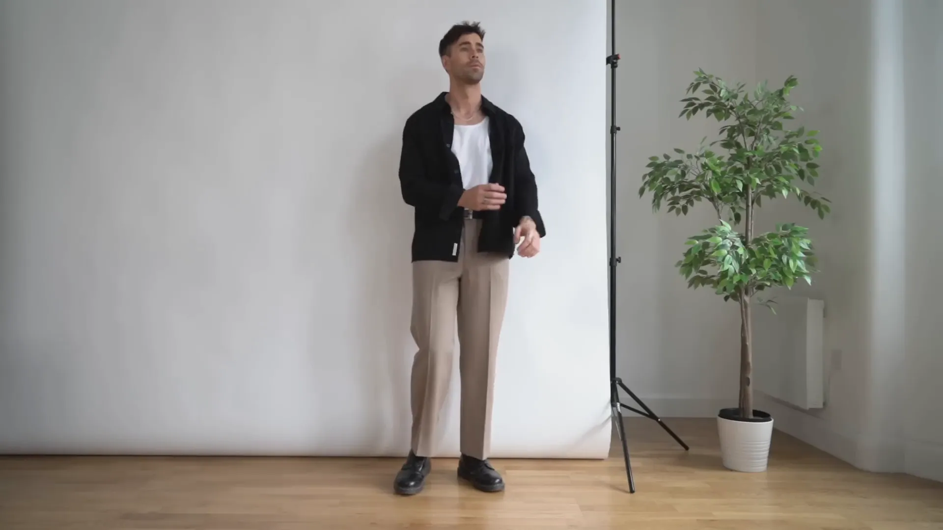 Smart casual outfit with black over shirt and white vest