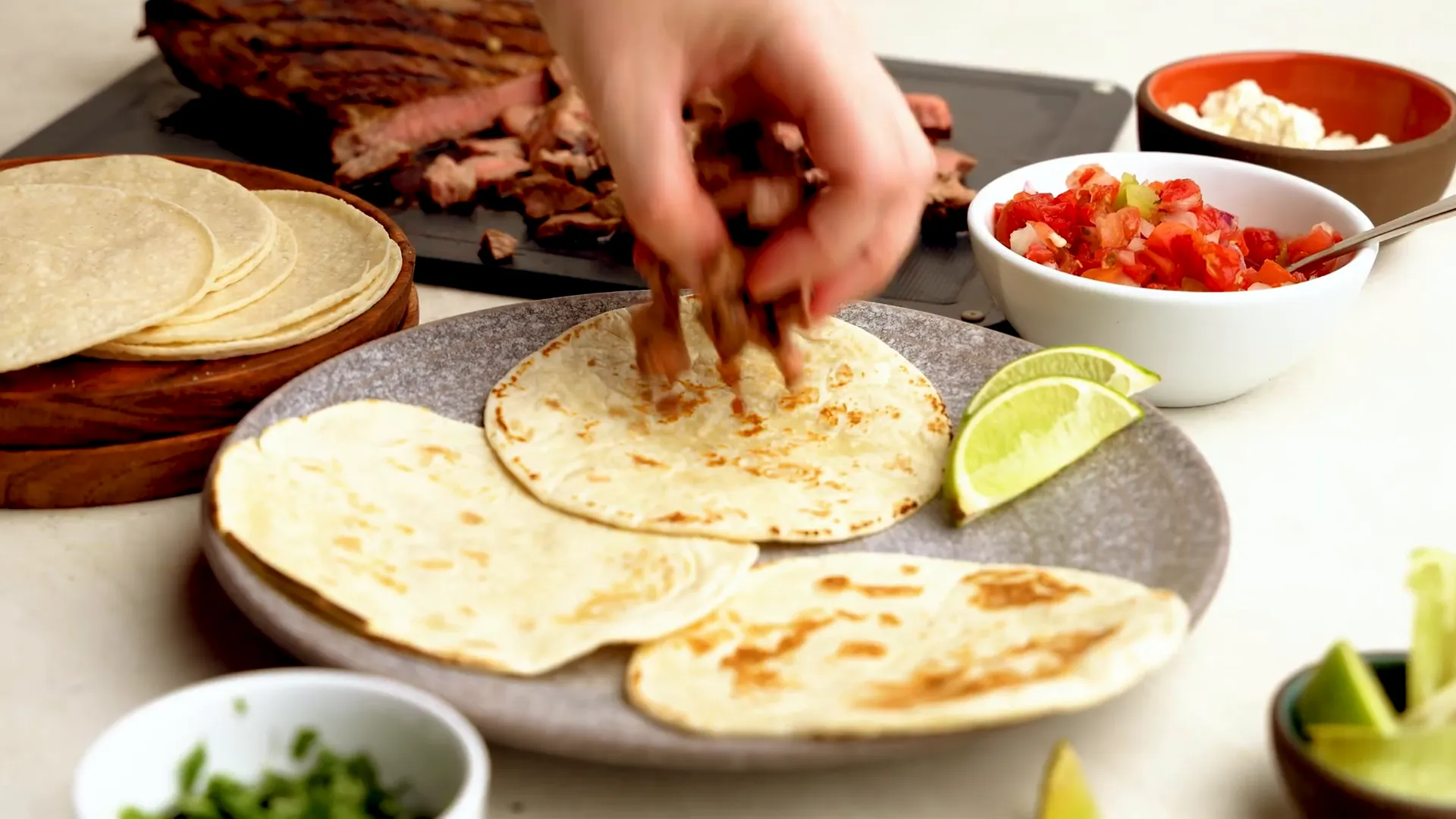 Assembled carne asada tacos ready to serve