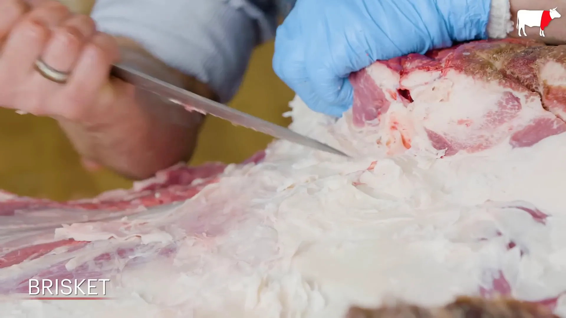 Removing the brisket from the chuck section