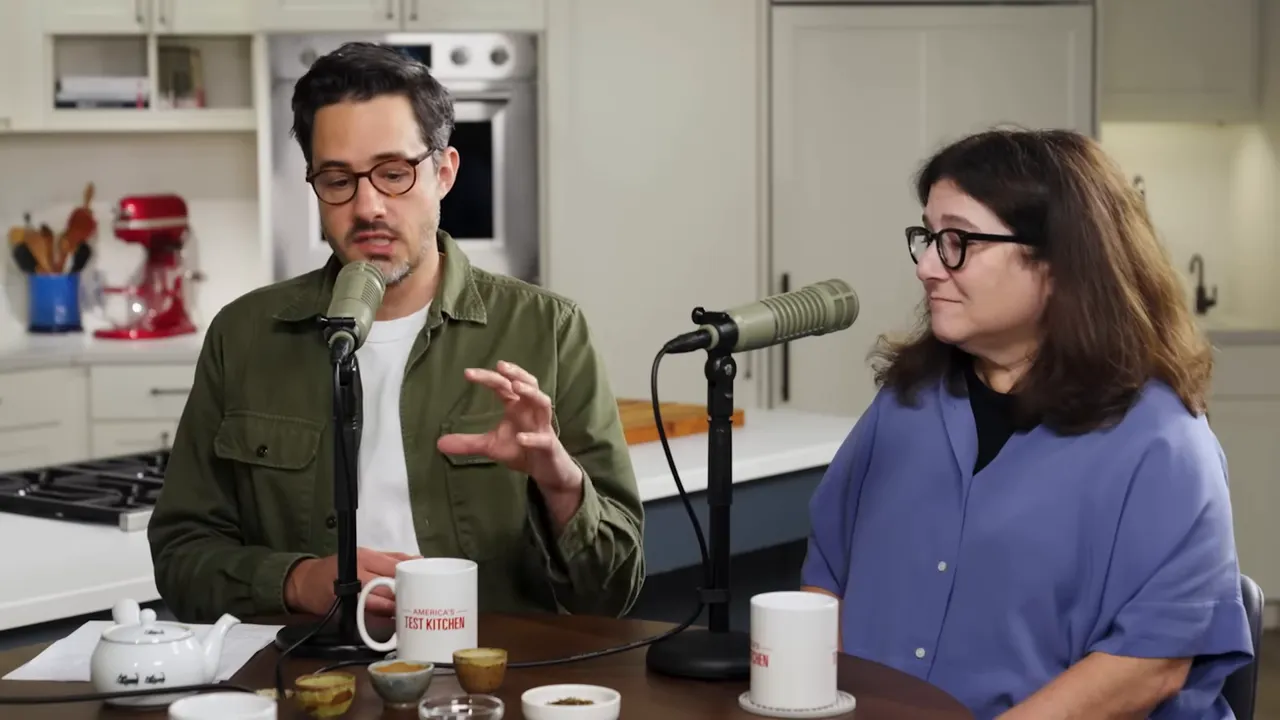 Host pouring and smelling hojicha tea