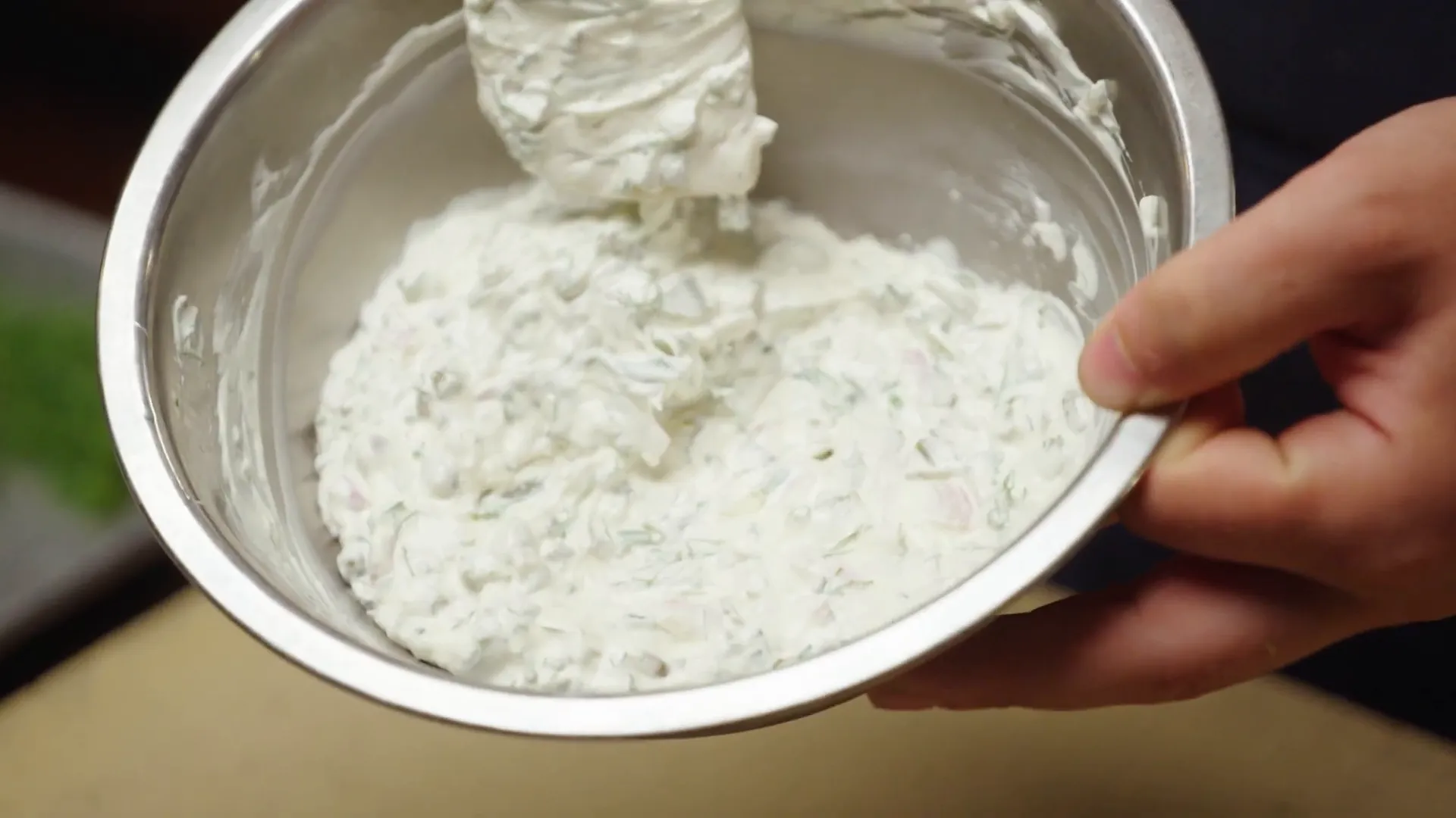 Chunky homemade tartar sauce with herbs and pickles