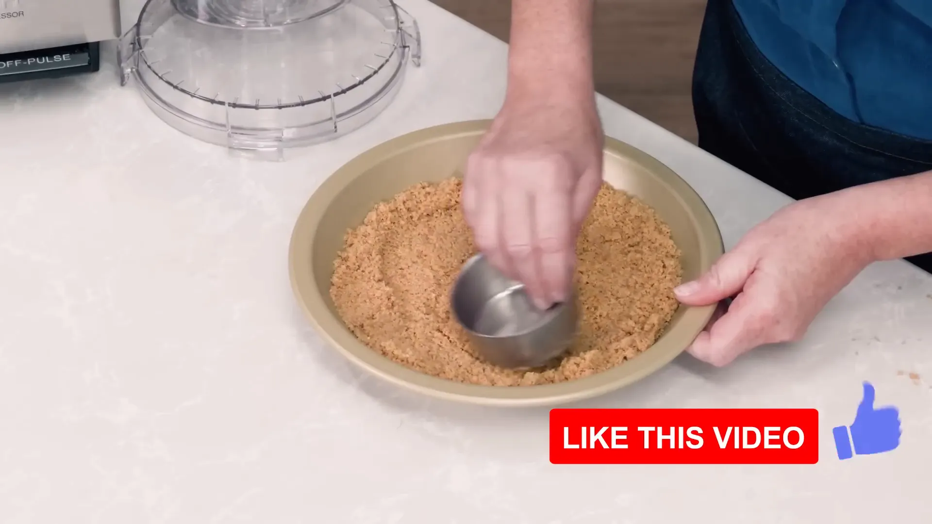 Pressing graham cracker crust into pie plate