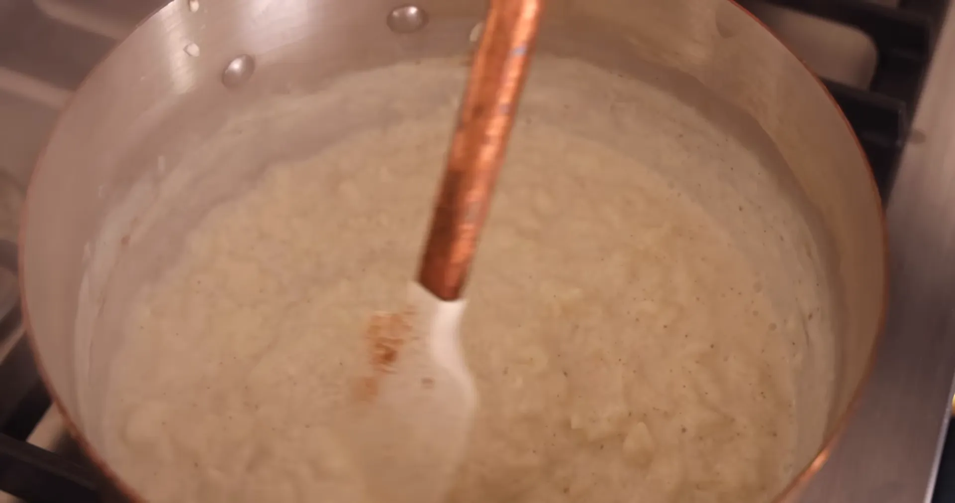 Rinsing short-grain rice in a sieve