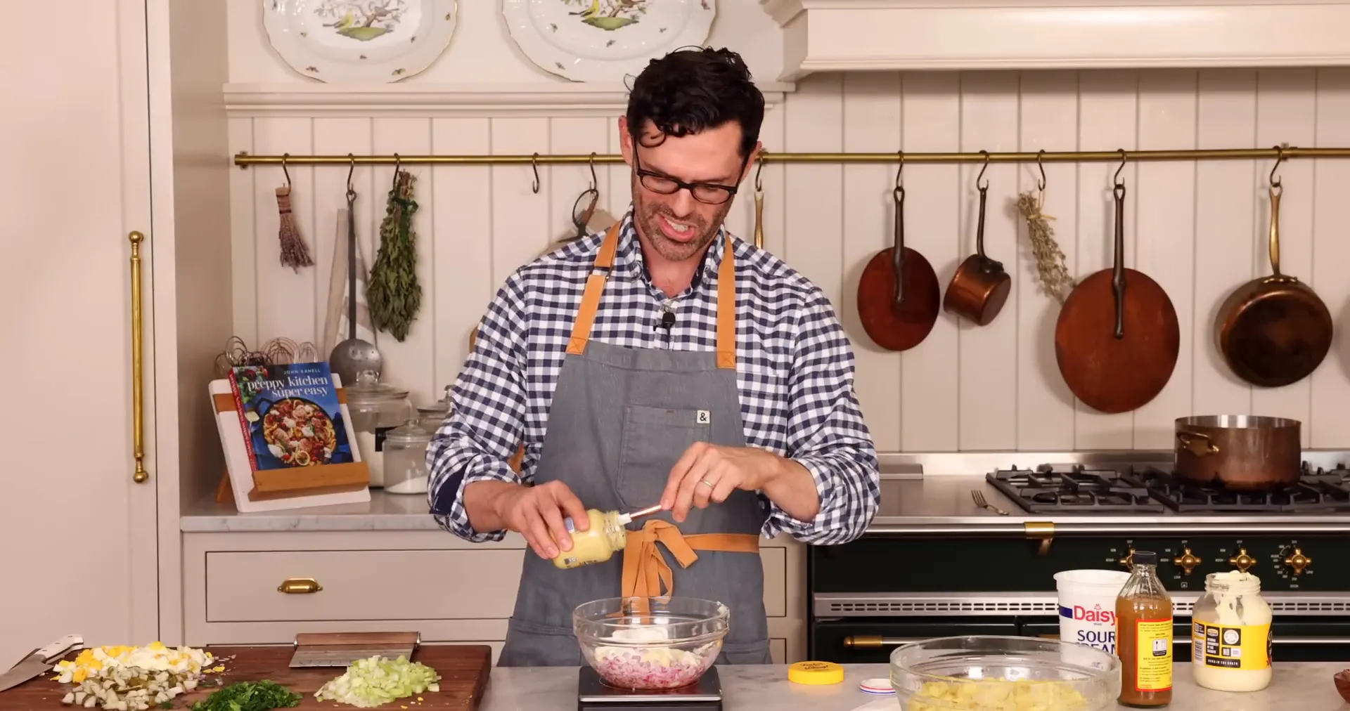 Mixing creamy dressing ingredients in a bowl