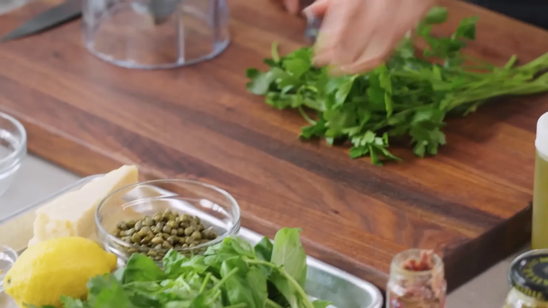 Ingredients for anchovy basil sauce in the blender