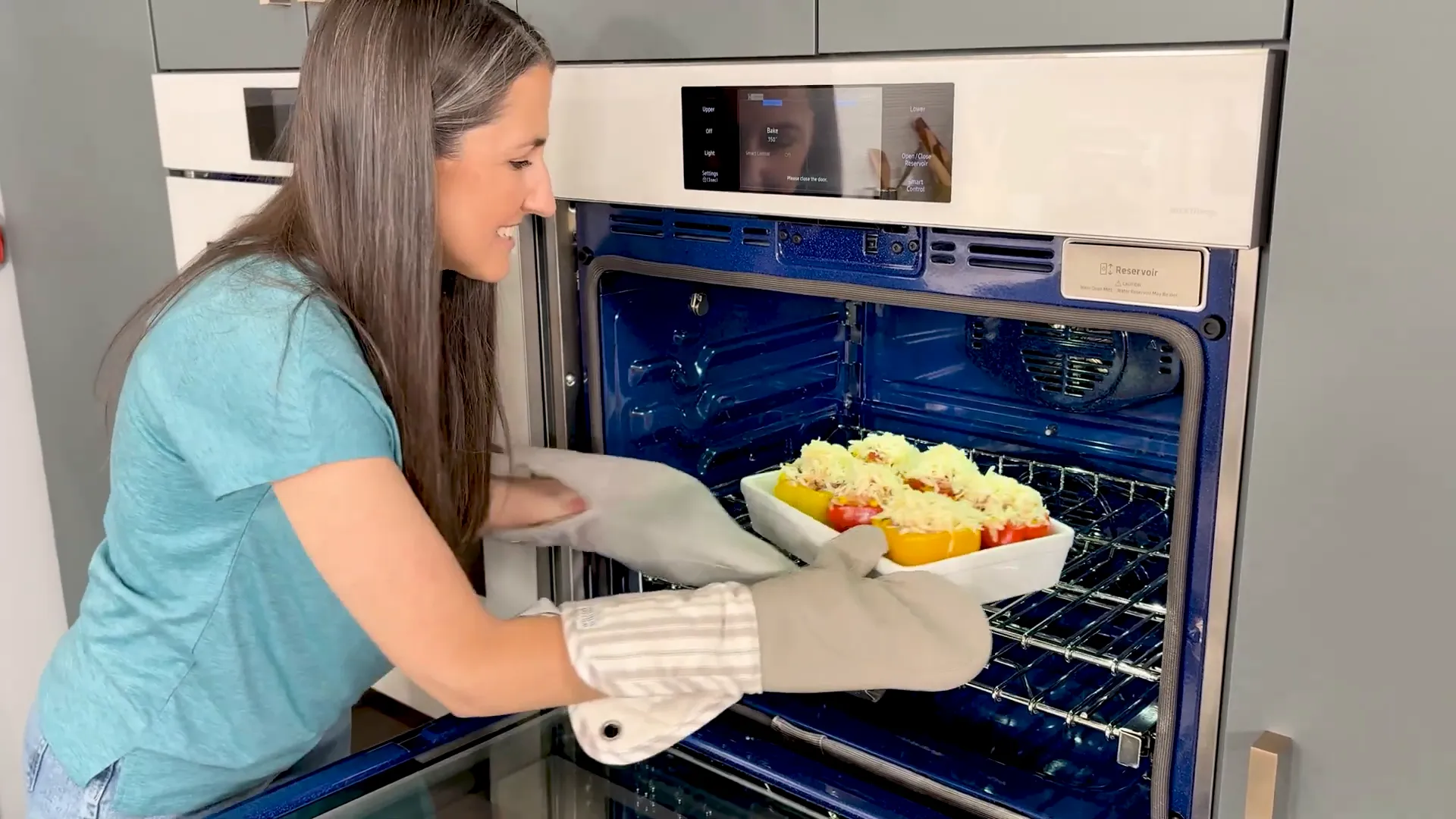 Baking stuffed bell peppers with melted cheese