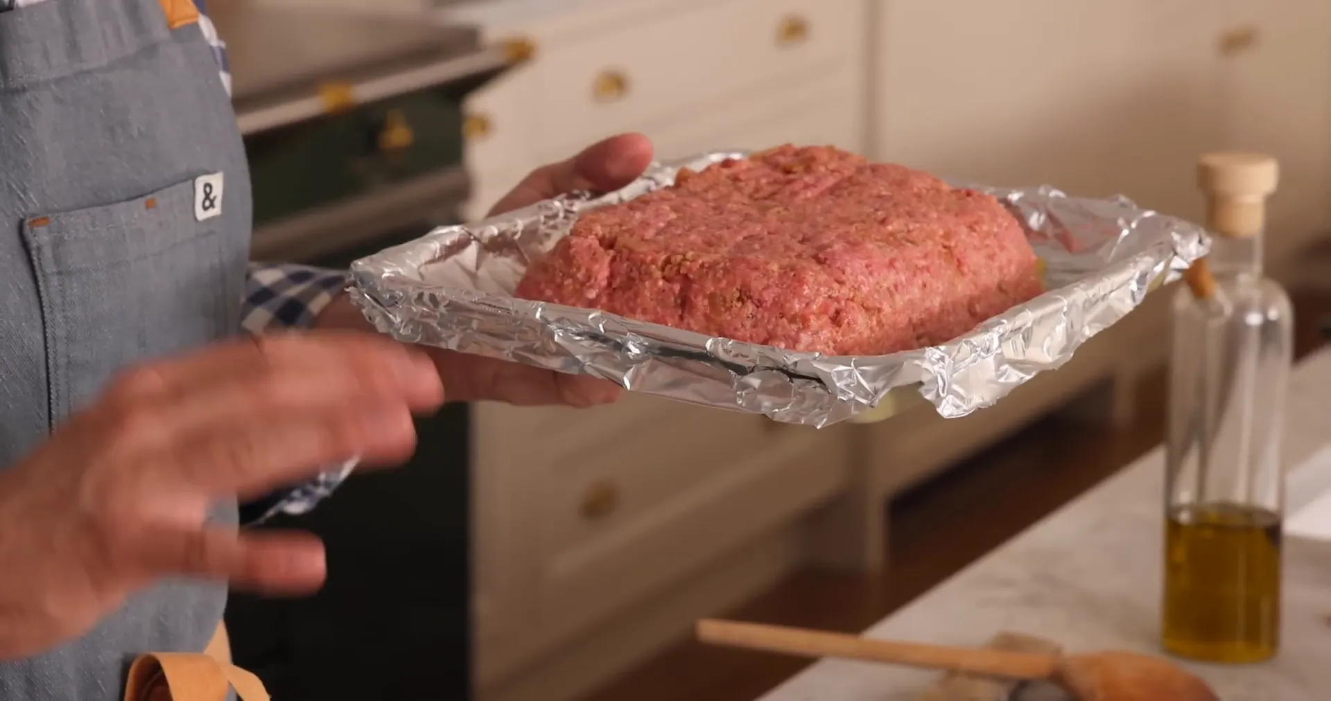 Shaped meatloaf ready to bake on sheet pan