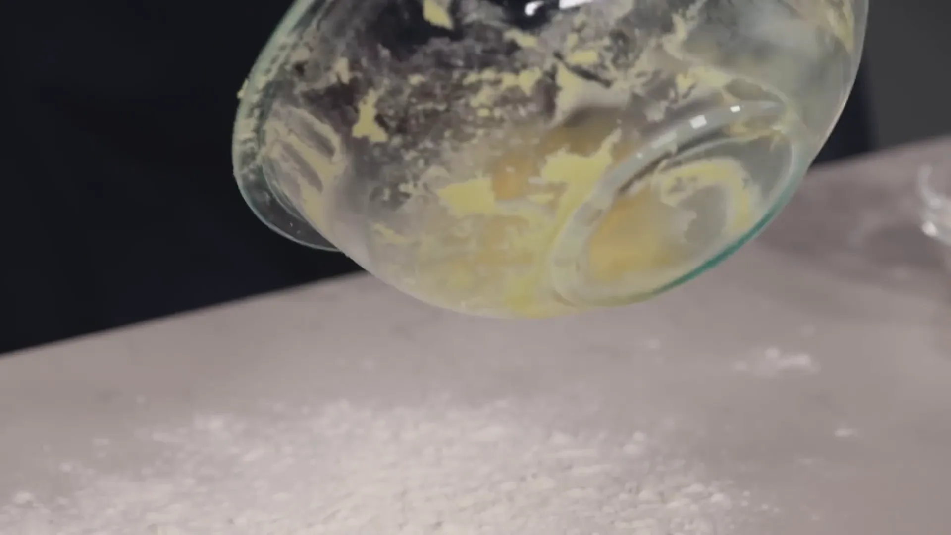 Sticky shortcake dough being kneaded on a floured surface