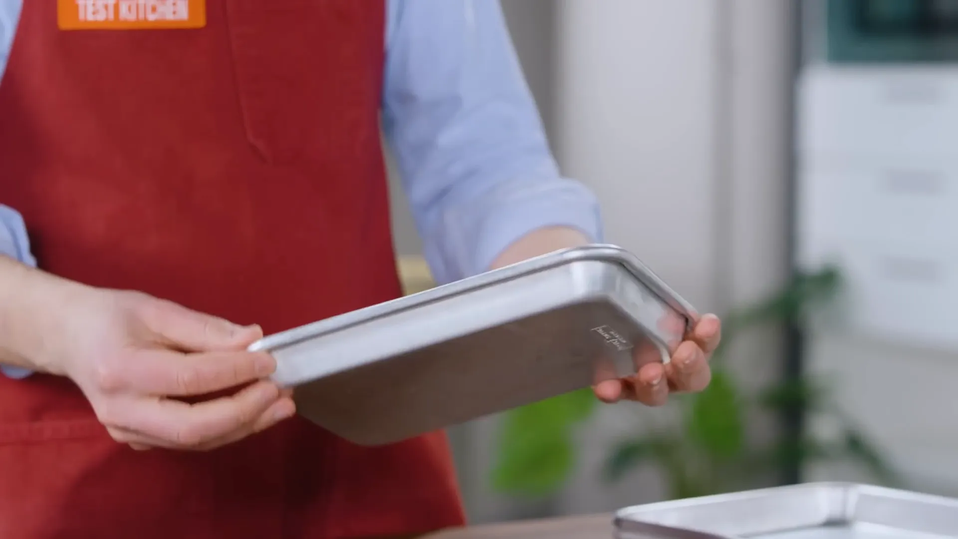 Eighth sheet pan with grated cheese and spoon rest